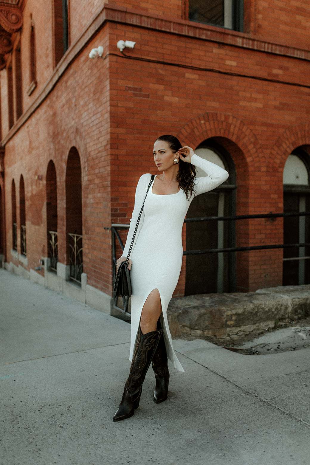 Baila Sweater Dress with a slit. Black Baila Sweater Dress with a slit. Black